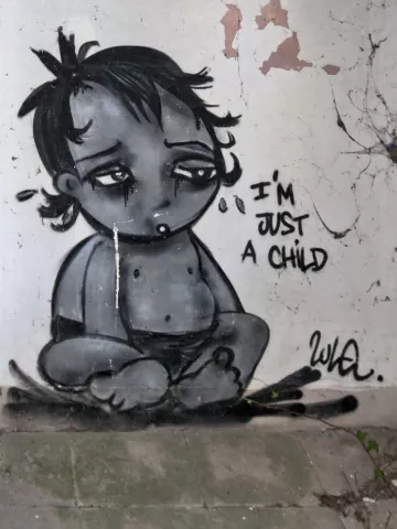 Graf : "I'm just a child" réalisé par Lüle en janvier 2014Photo : Stéphane 10/2020